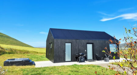 Svartaborg Tiny House is Nordic Retreat Sitting on Sprawling Icelandic Landscape Experience-Downsized-Living-Without-Fully-Committing-to-it-With-This-Dwelling-in-Húsavík,-Iceland