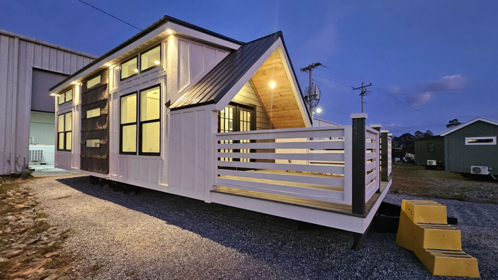 $83K Horizon Tiny House Built for Family has Bunk Room and Loft With Enclosed Porch The enclosed porch and gabled roof give farmhouse aesthetic to the Horizon tiny house