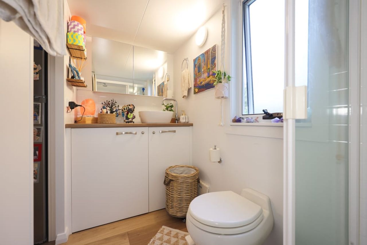 Koby’s Tiny House Features Two Standing Lofts With Connecting Catwalk