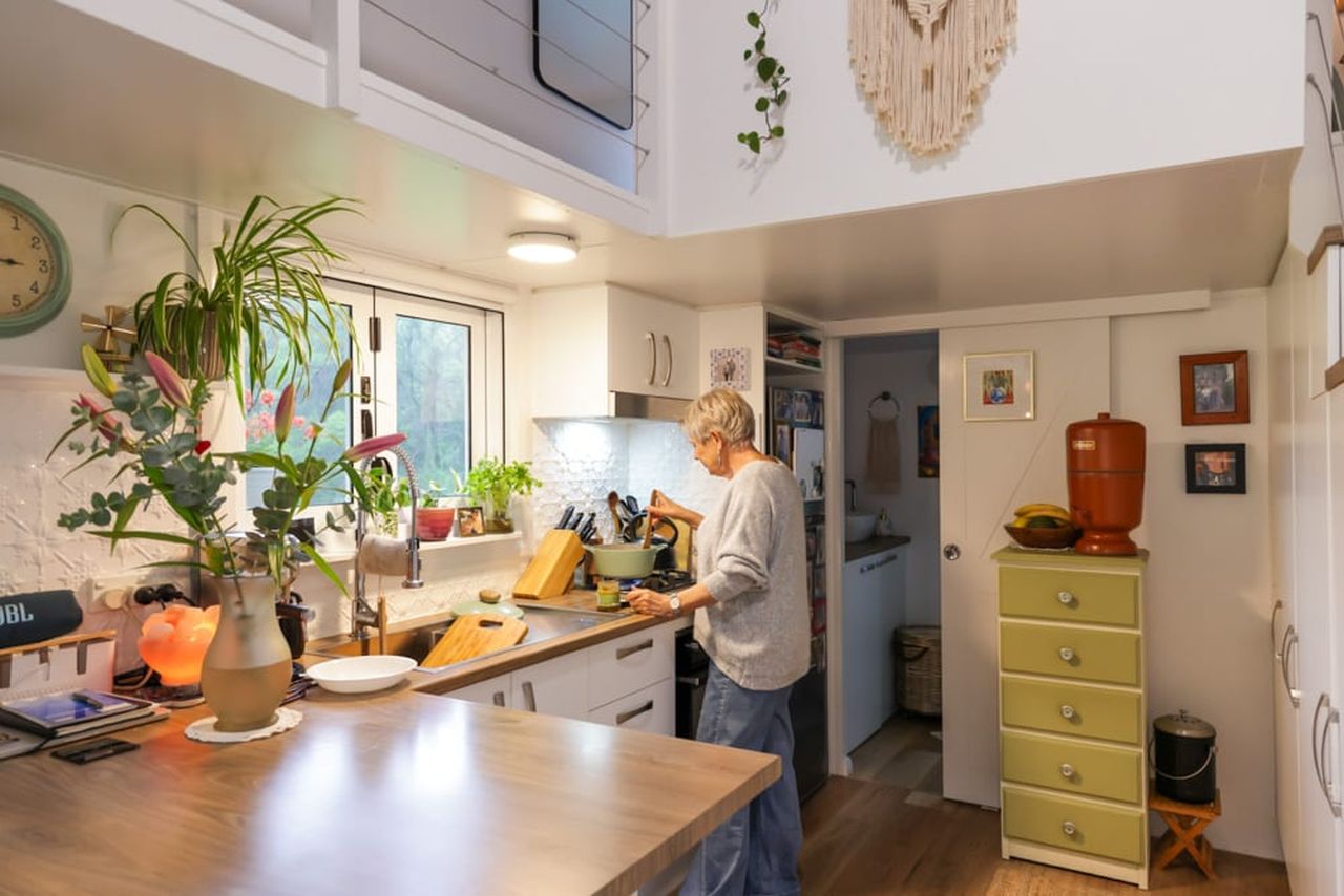 Koby’s Tiny House Features Two Standing Lofts With Connecting Catwalk