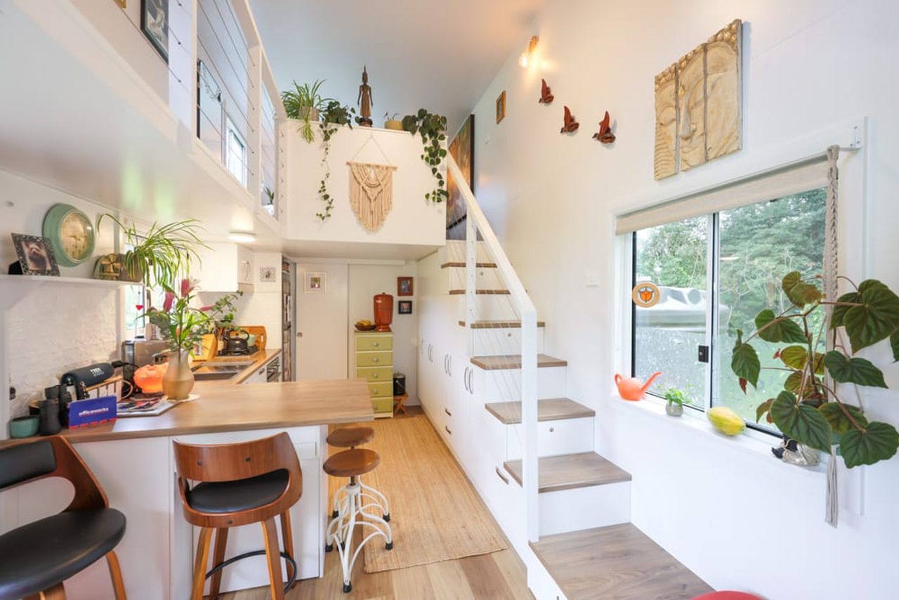 Koby’s Tiny House Features Two Standing Lofts With Connecting Catwalk