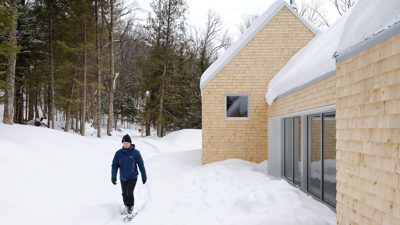The residence engulfed by snow
