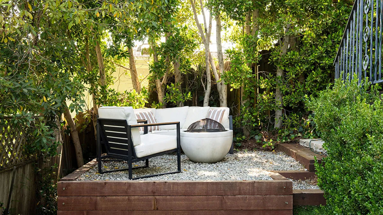 Outdoor firepit area in the Spanish-style dream house