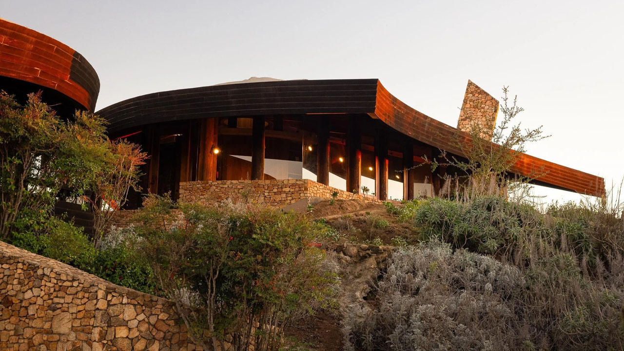 The Old Castle Road House sits atop rocky terrain