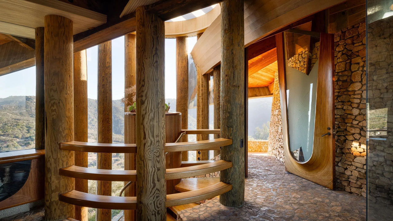 The raw wooden pillars add texture to the space