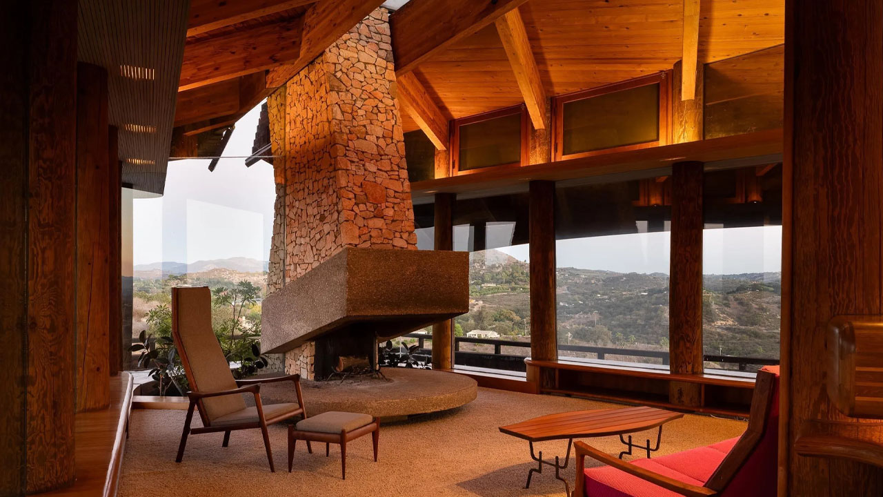 The monolithic fireplace in the living zone