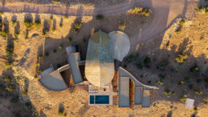 Placitas House Looks Like Gigantic Dinosaur Taking Nap in Deserted Wild Badland