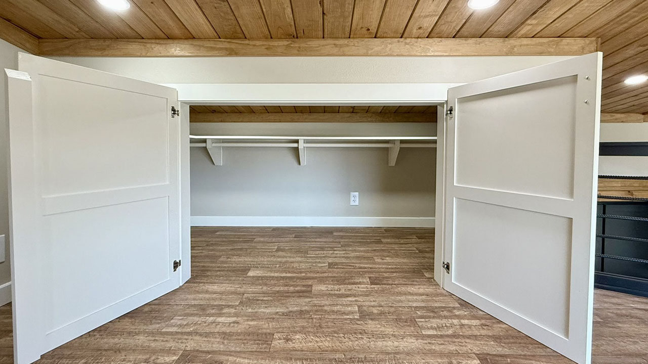 Primrose Tiny House - loft crawl-in closet
