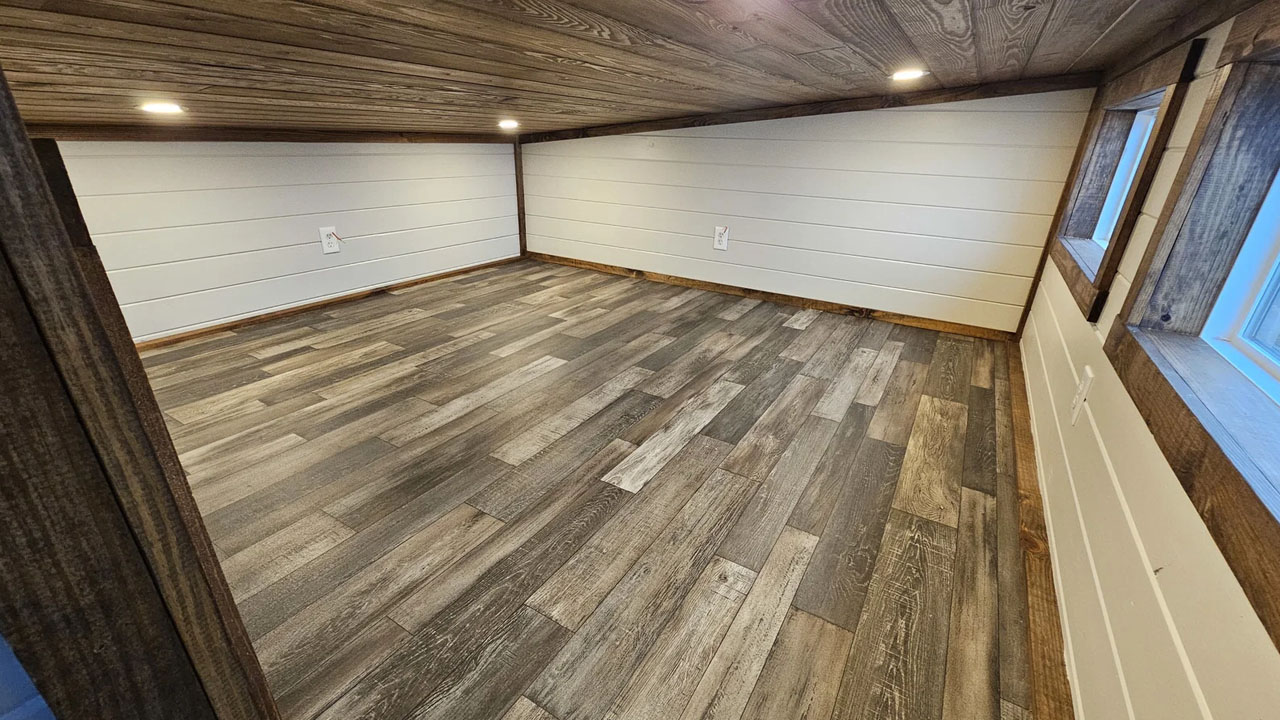 The spacious loft can function as a workspace as well