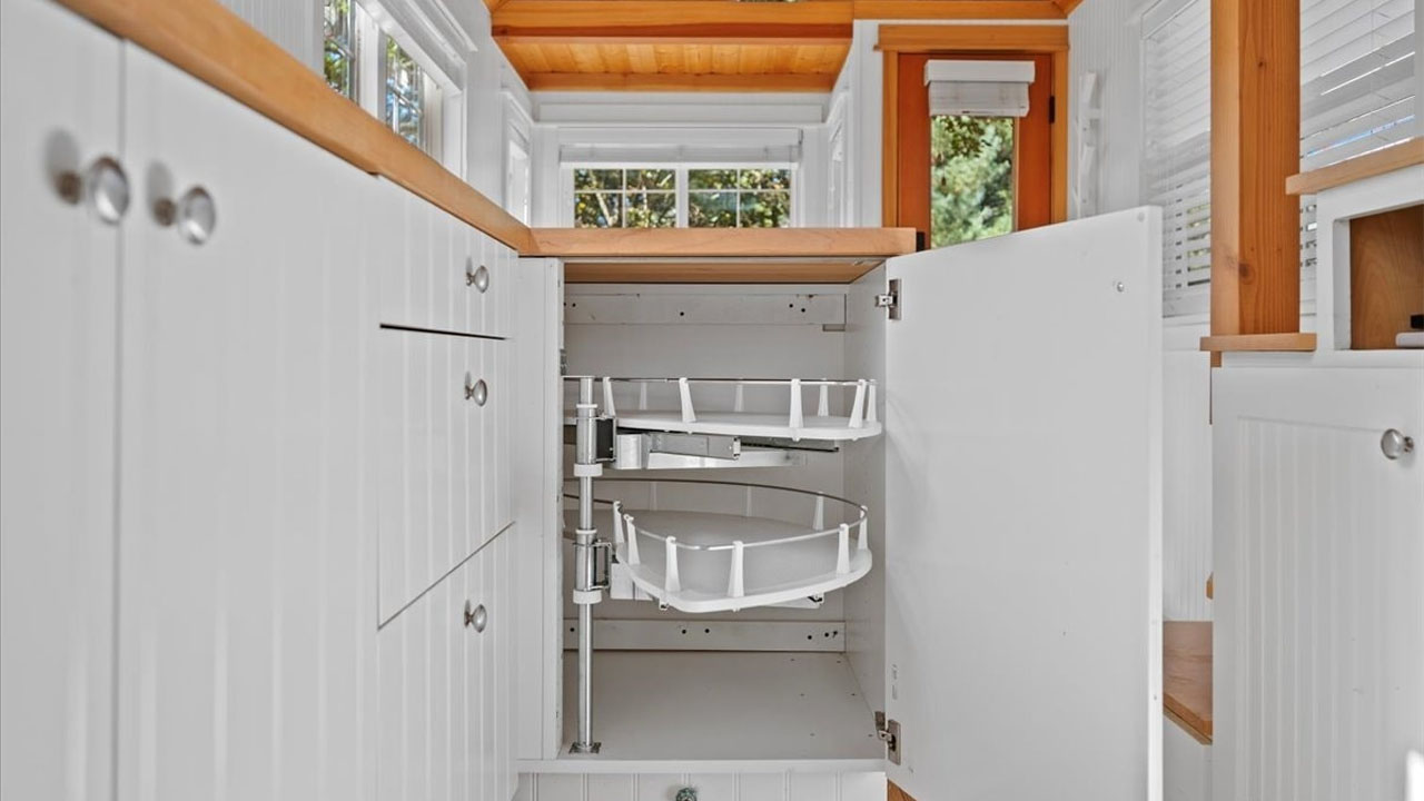 The swing-out shelf system in cabinet