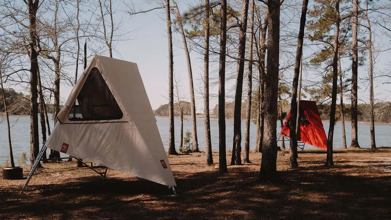 The British American Camping K1 tents perched within woodlands