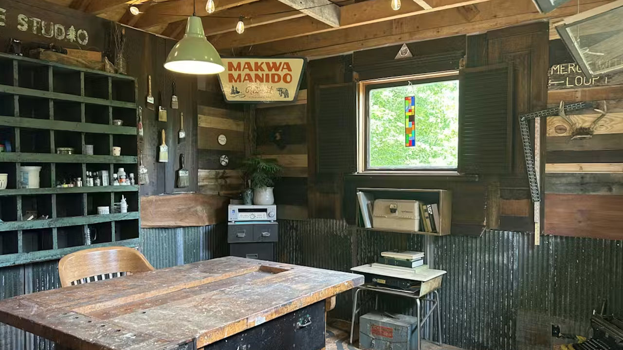The detached art studio has lovely rustic charm