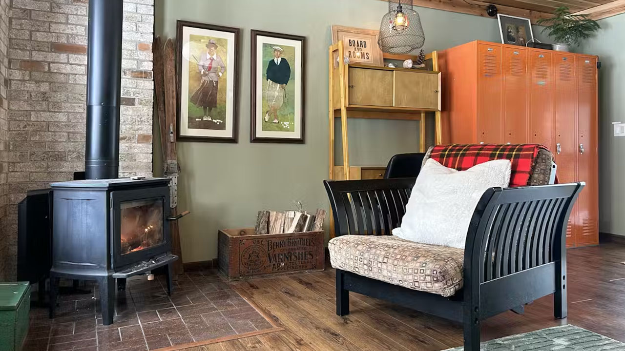 the wood burning fireplace of the Camp Green Pine