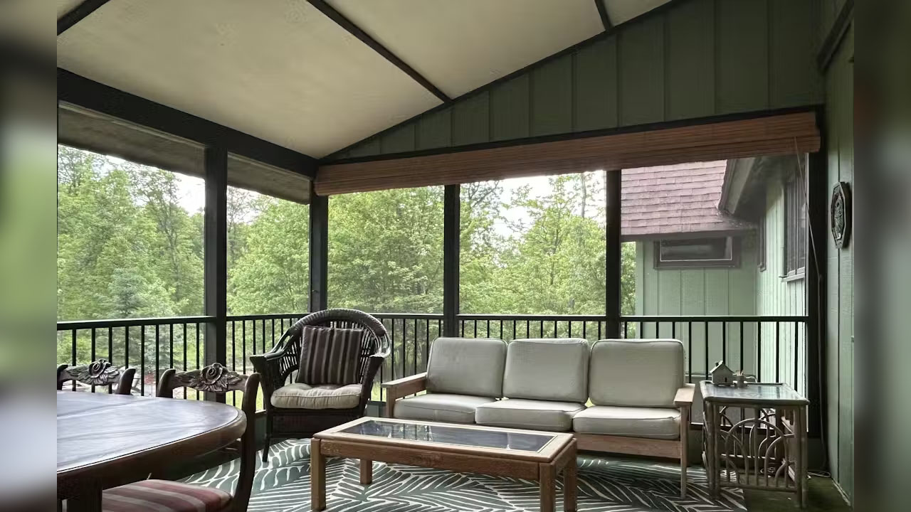 The screened porch of Camp Green Pine