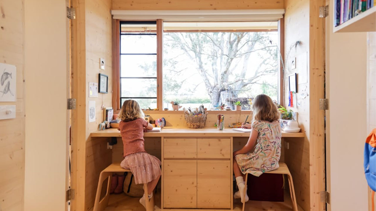 Kids studying in their separate desks