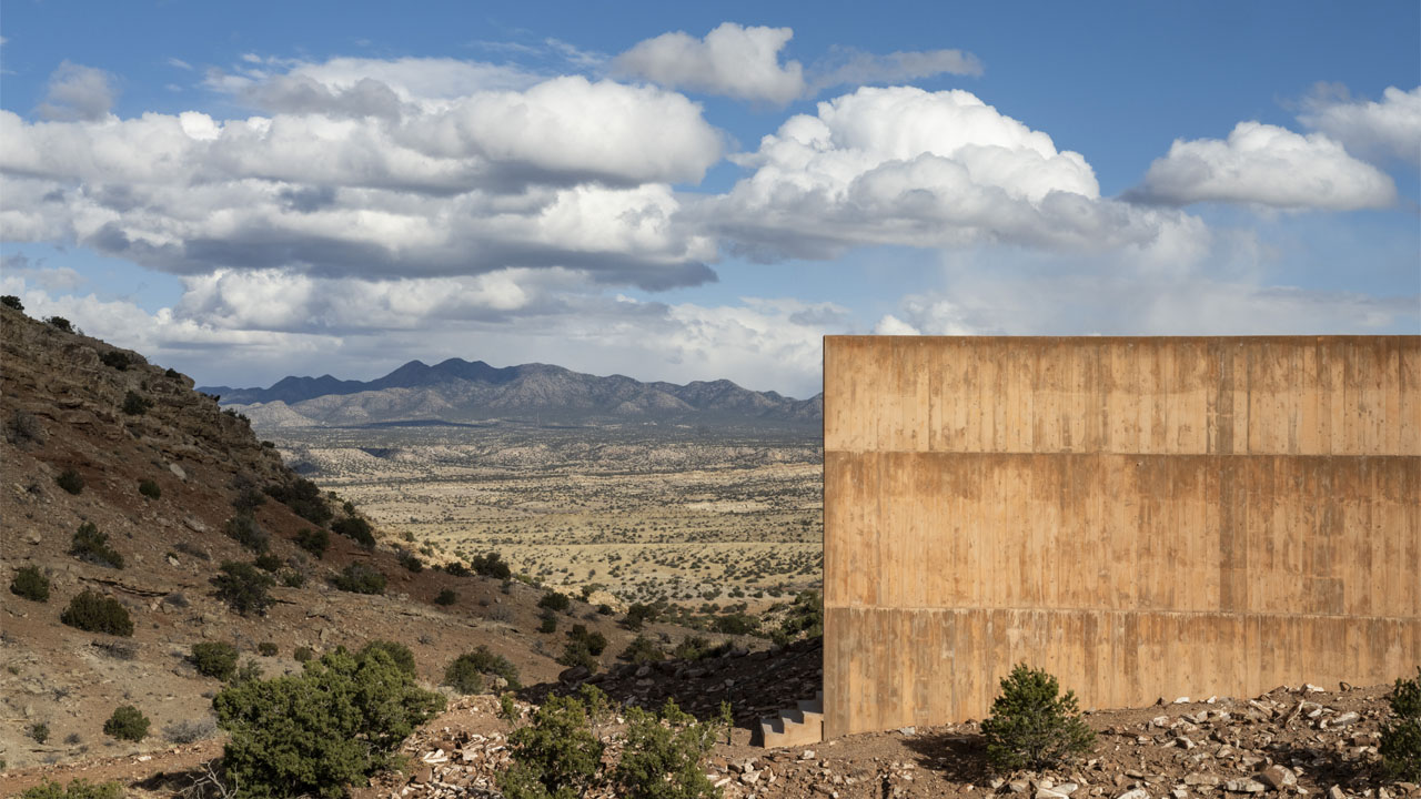 The thick concrete walls absorb heat to regulate internal temperature naturally