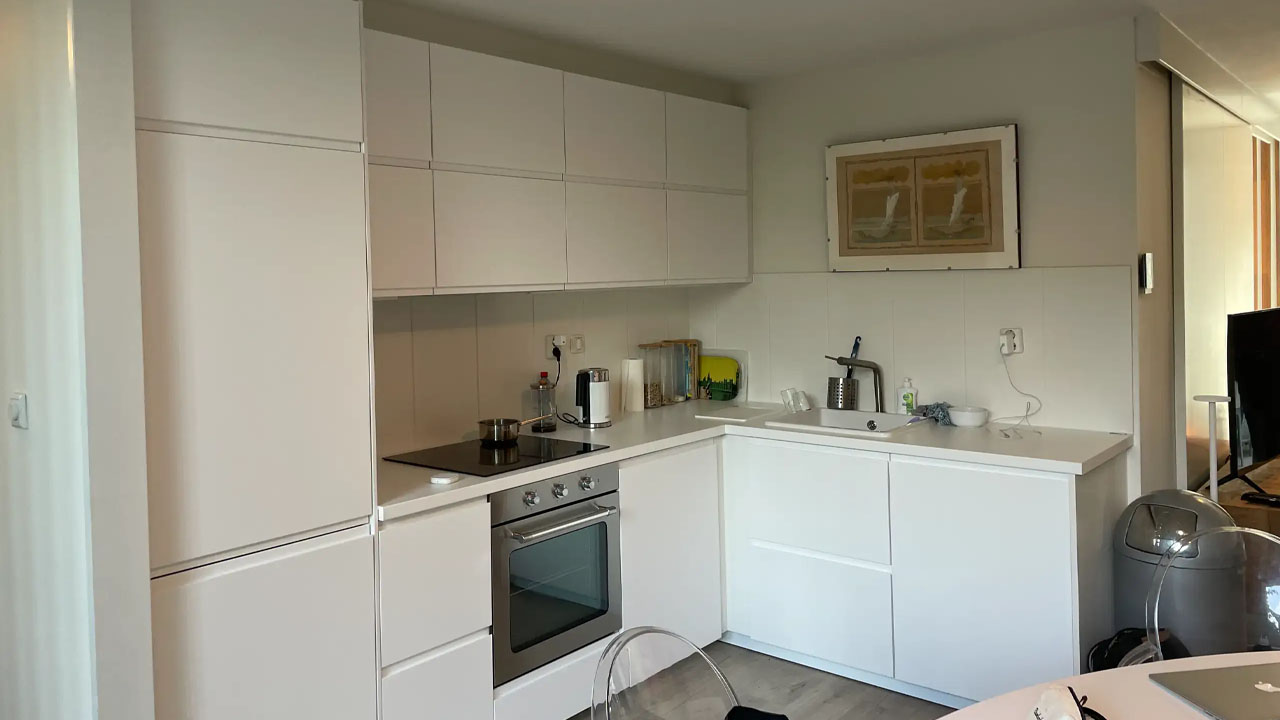 High-end kitchen has beautiful white cabinetry