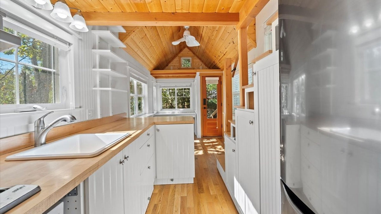 This 235 sq. Feet Move-in Ready Tiny House Reveals Matrix of Hidden Space-Efficient Utilities Inside Captivating Interior