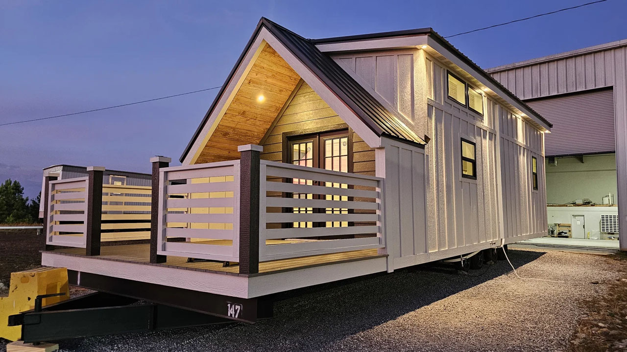 This 400 sq. ft. A-Frame Tiny House Built for Family, Features Bunk Room and Loft Bedrooms with Enclosed Porch