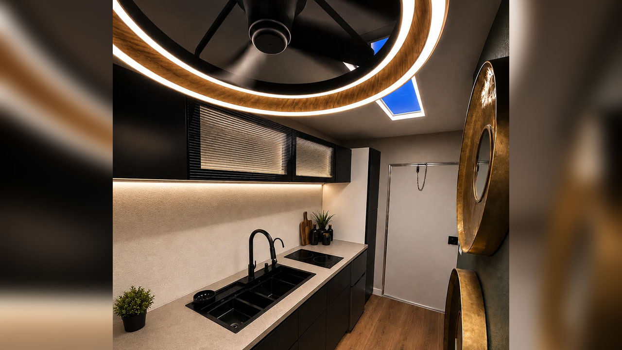 The LED light strip wrapped circular ceiling fan circulates cool air while illuminating the interior