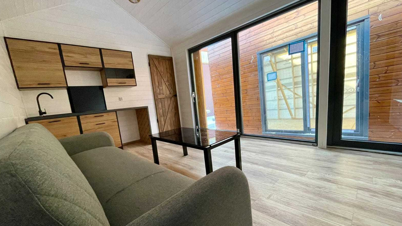 Mini Domek Tiny House by Mini Domy living room