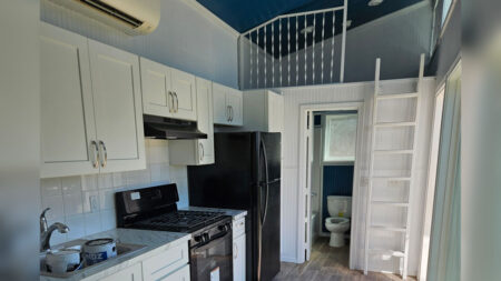 270 sq. ft. Sunny Skillion Tiny House Packs Two Bedrooms and a Full Bathroom in its Seaside Cottage Interior