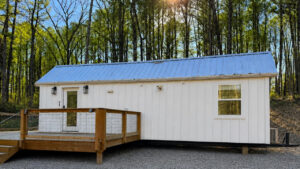 Farmhouse Tiny House Features Thoughtful Storage and Built-In Catwalk farmhouse tiny house