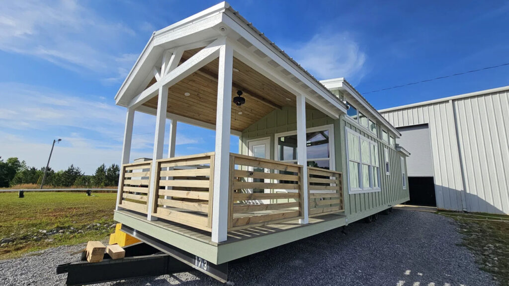 $94k Rustic Roost Tiny House Tucks Deep-set Front Porch and two Bedrooms in 400 sq.ft. Footprint