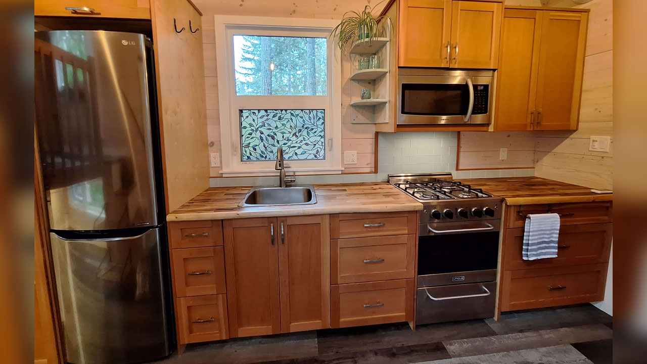 The functional kitchen is equipped with ample storage and