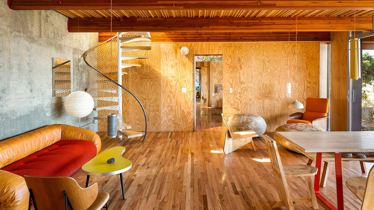 the decorative spiral stairs lead to the lower floor.