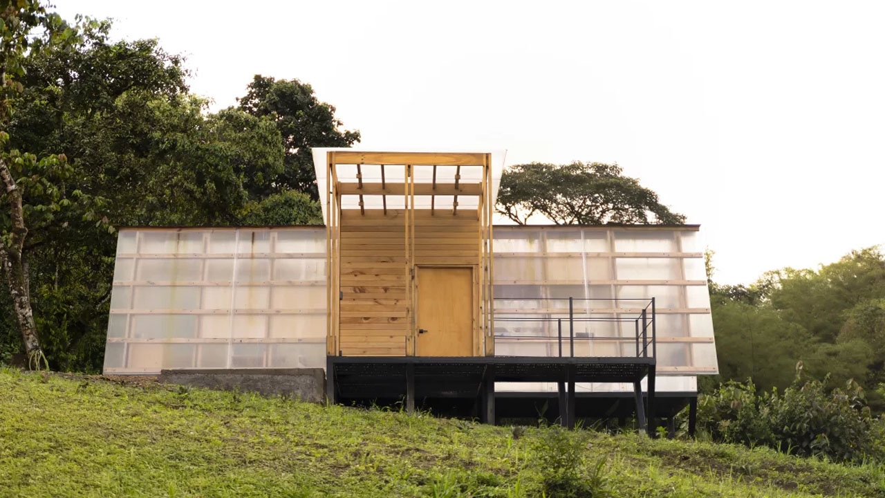 The wooden framework is visible through the translucent cladding