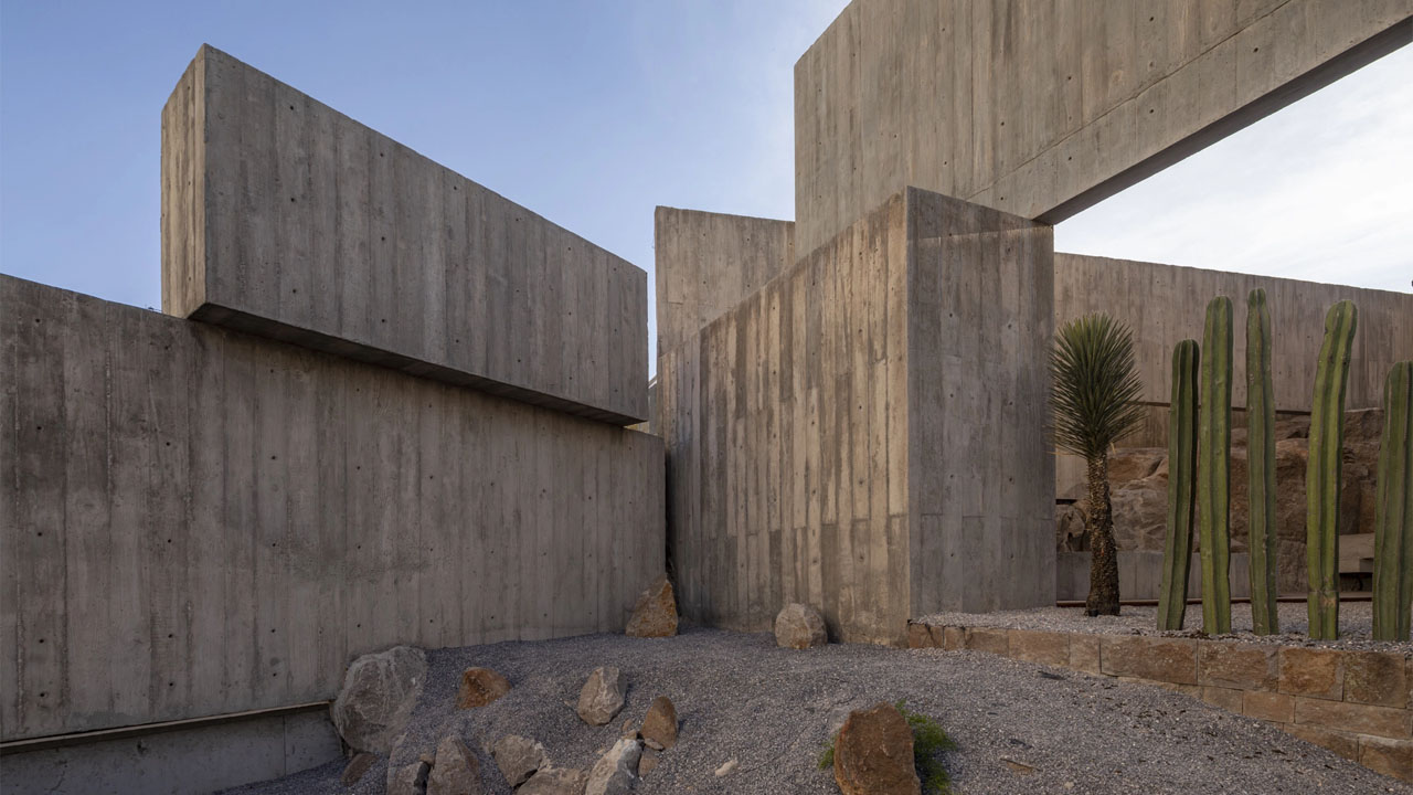The concrete walls mimic the natural rock outcrops