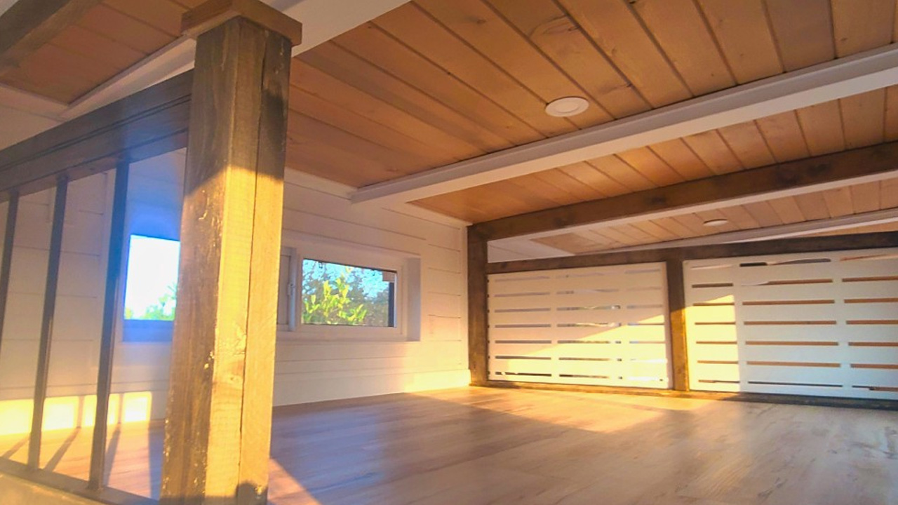 loft bedroom of cinnamon bear tiny house 