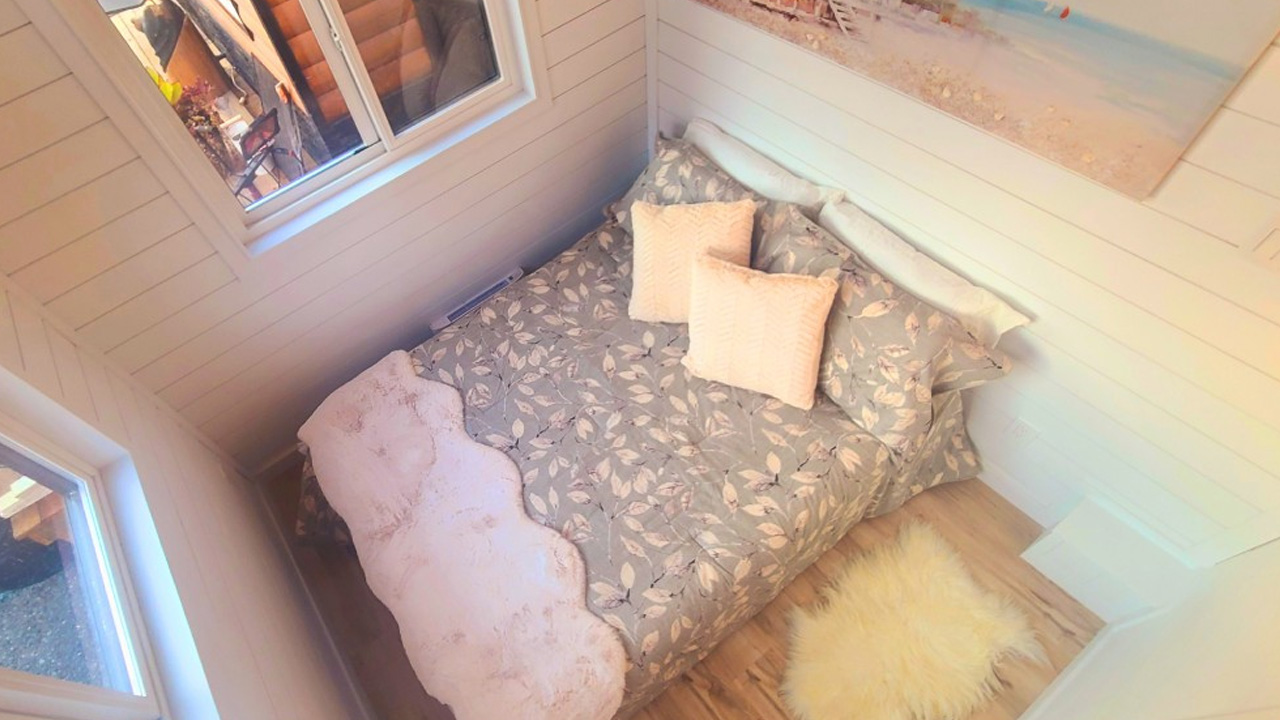 Ground-floor bedroom of cinnamon bear tiny house 