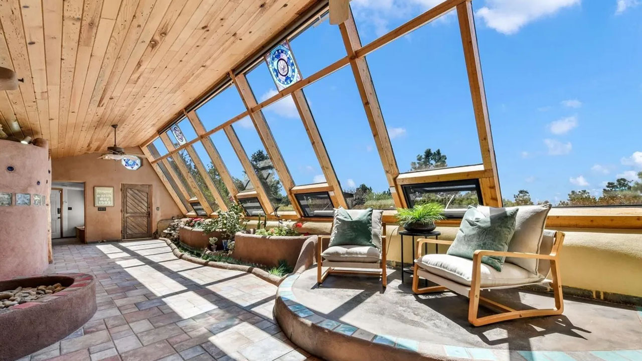 Earth Home for Sale in Black Forest Colorado - seating under window wall