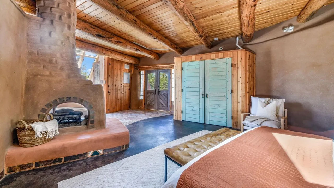 Earth Home for Sale in Black Forest Colorado - main bedroom with private patio access