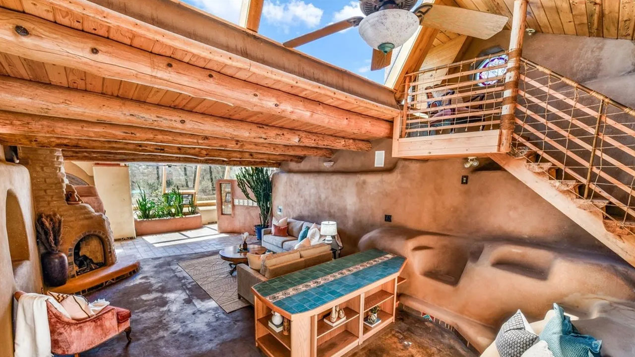 Earth Home for Sale in Black Forest Colorado - living room with built-in seating and storage