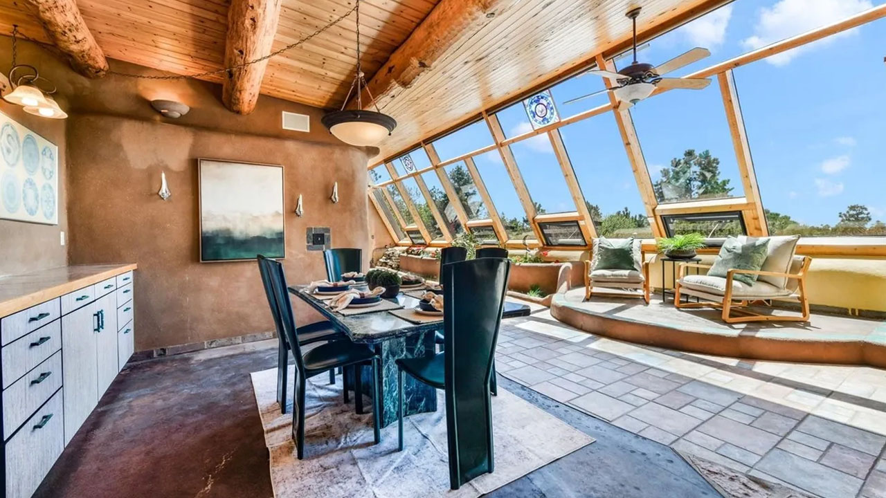 Earth Home for Sale in Black Forest Colorado - dining area next to the window wall