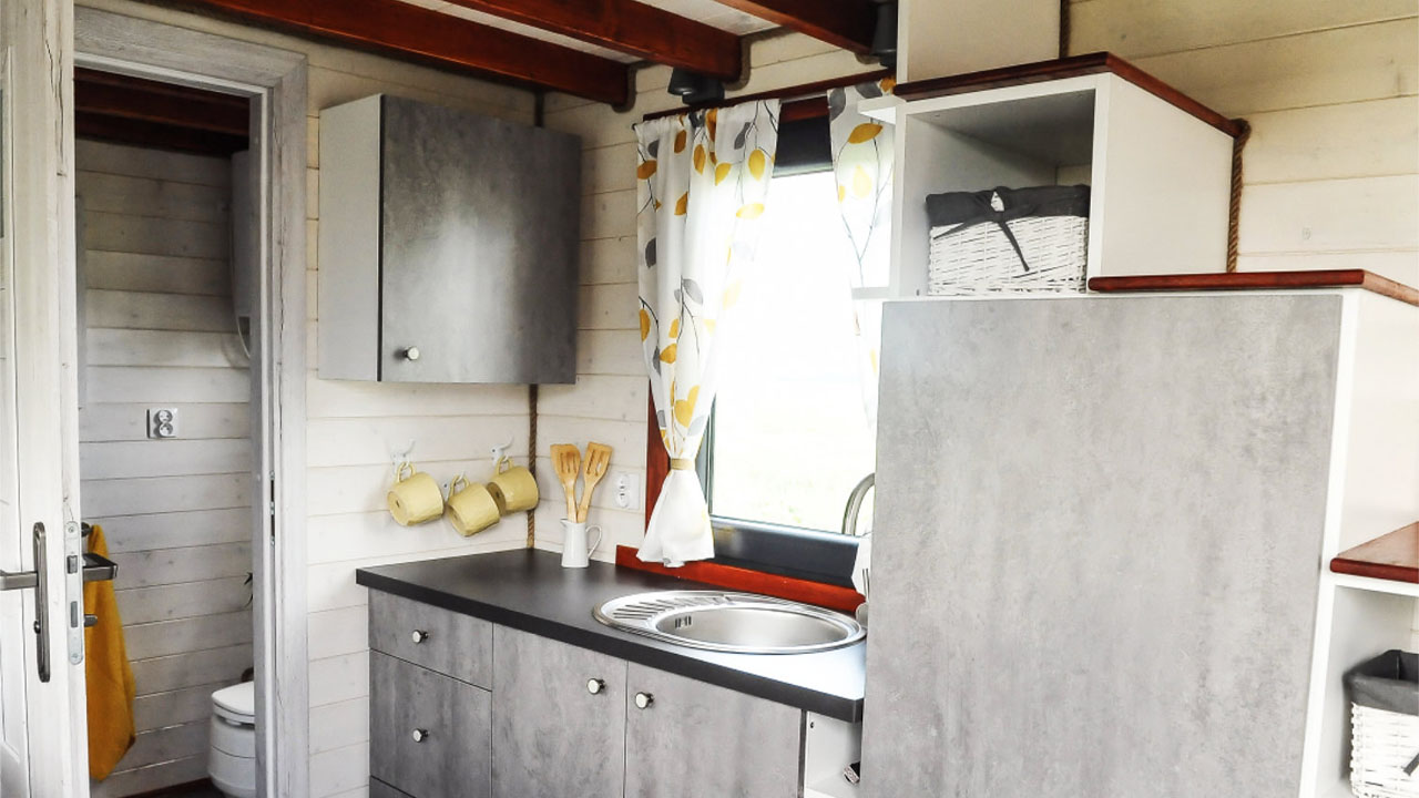 The galley kitchen has ample storage space