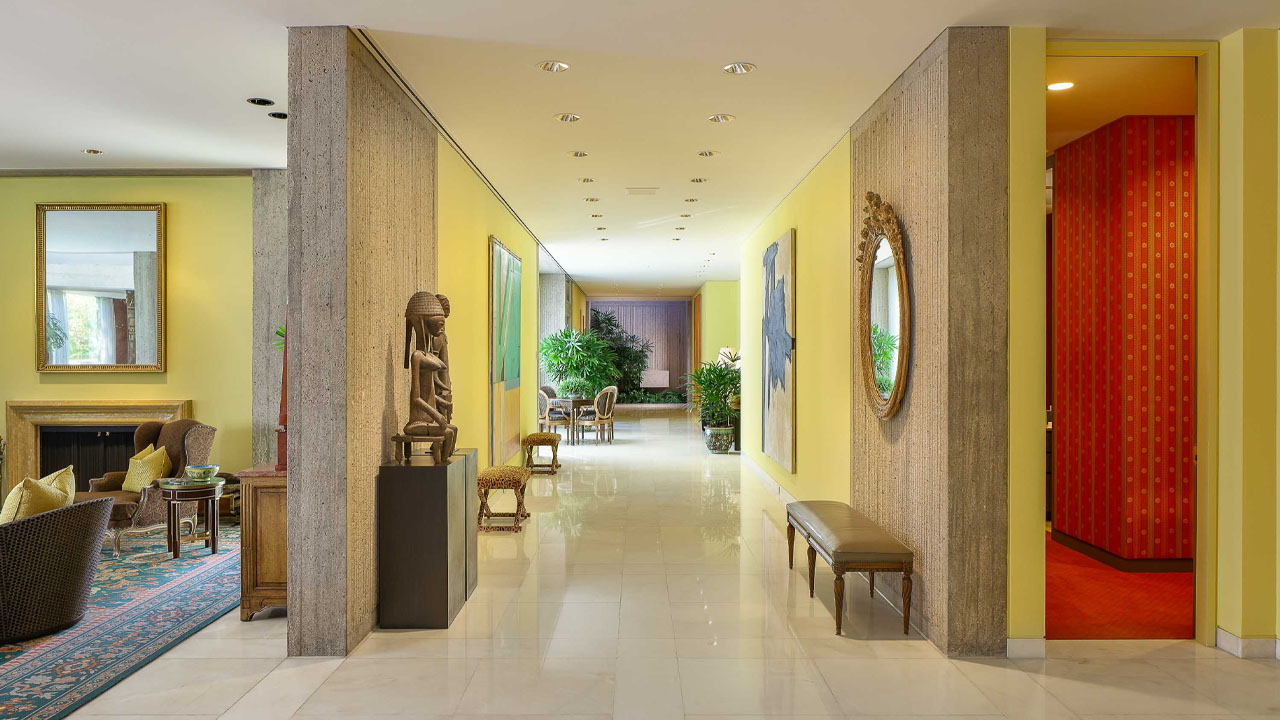 The hallway looks like entryway of a museum or theater