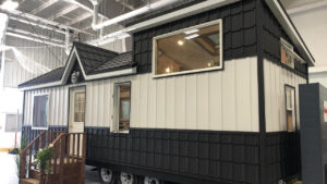 Mariposa Tiny House is Cottage on Wheels With Modern Minimalism and Rustic Aesthetic Mariposa tiny house-exterior