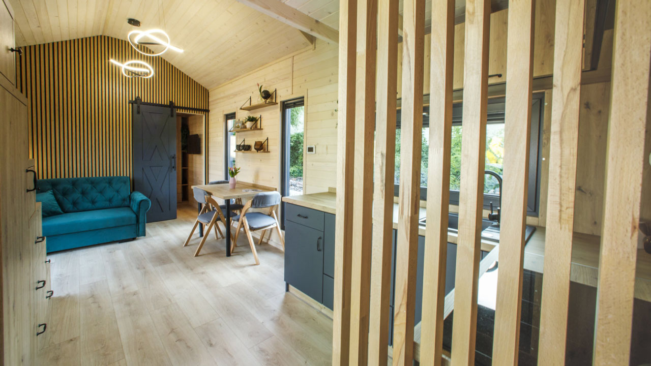 The slatted wooden panels filter light while giving unrestricted airflow