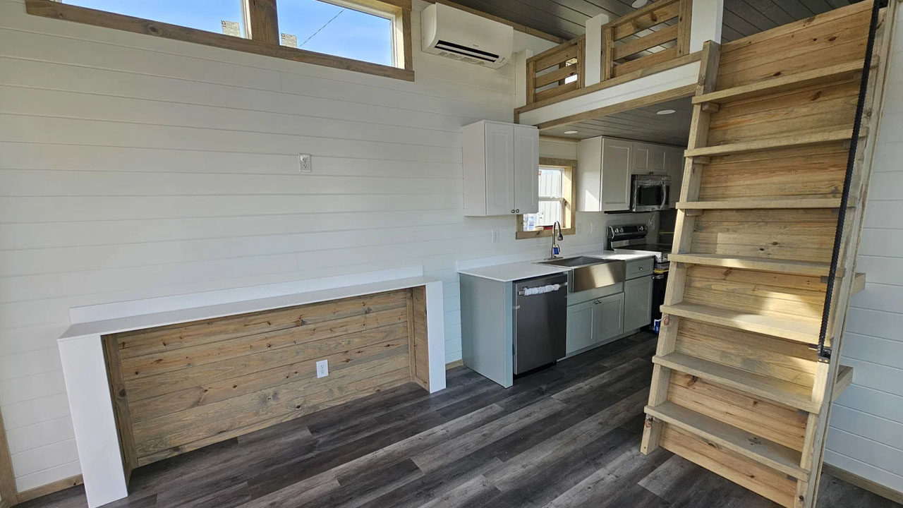 Th white shiplap cladded walls throughout the interior