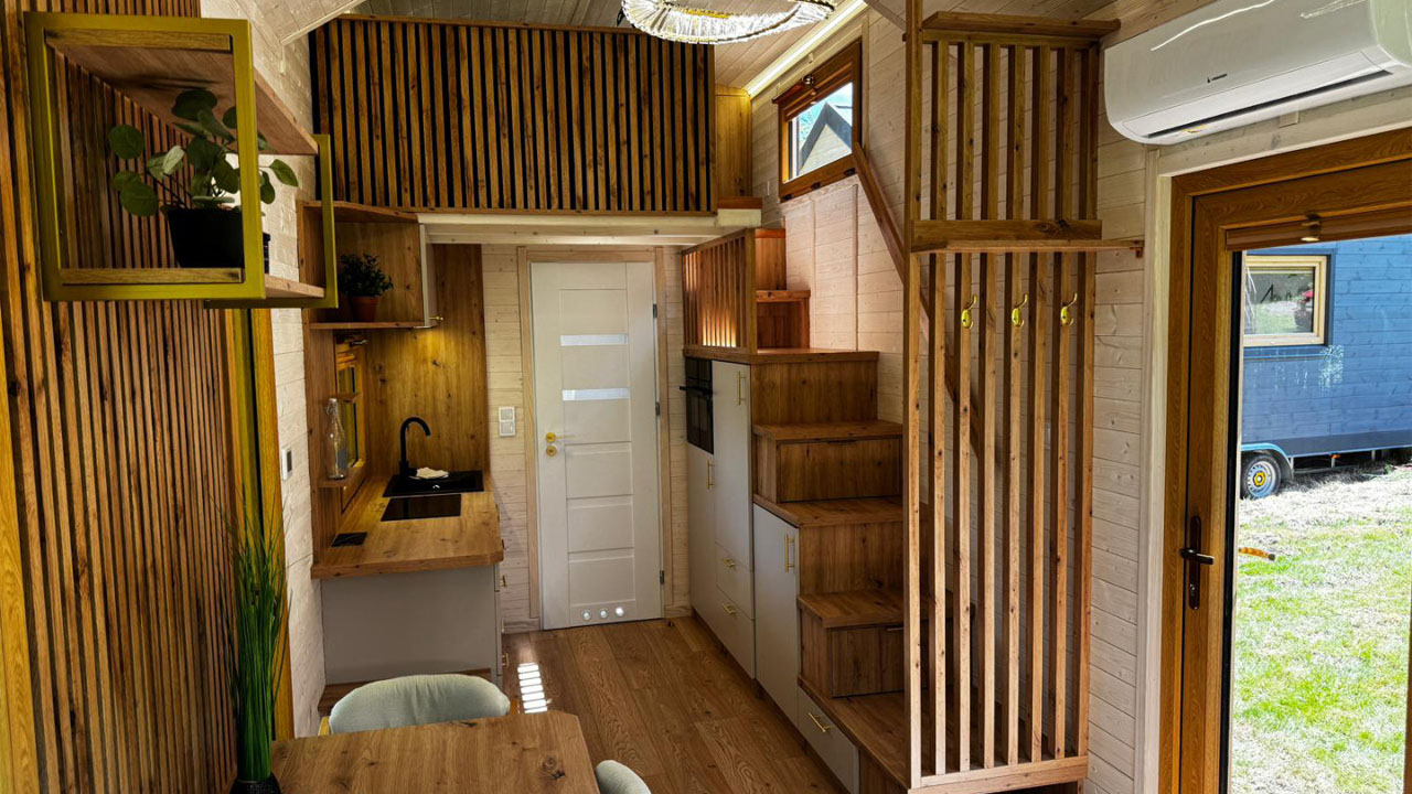 The striking slatted panels add privacy and filters daylight
