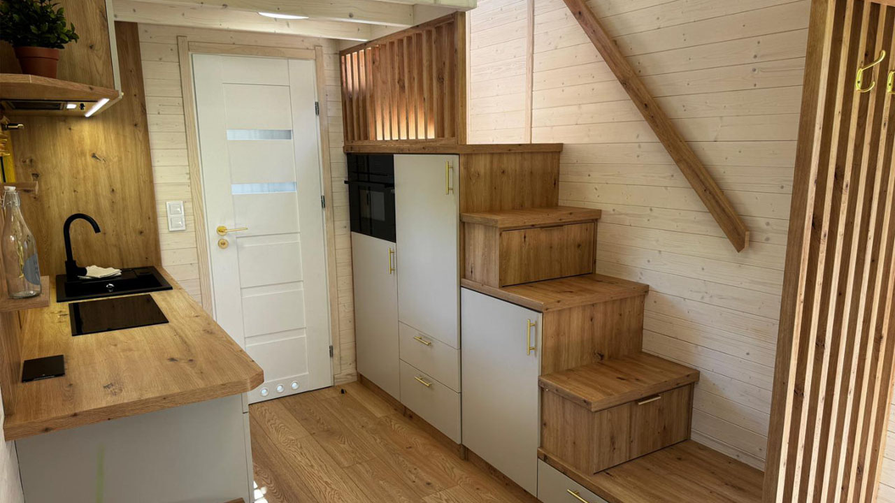 The bathroom tucked beneath the loft bedroom