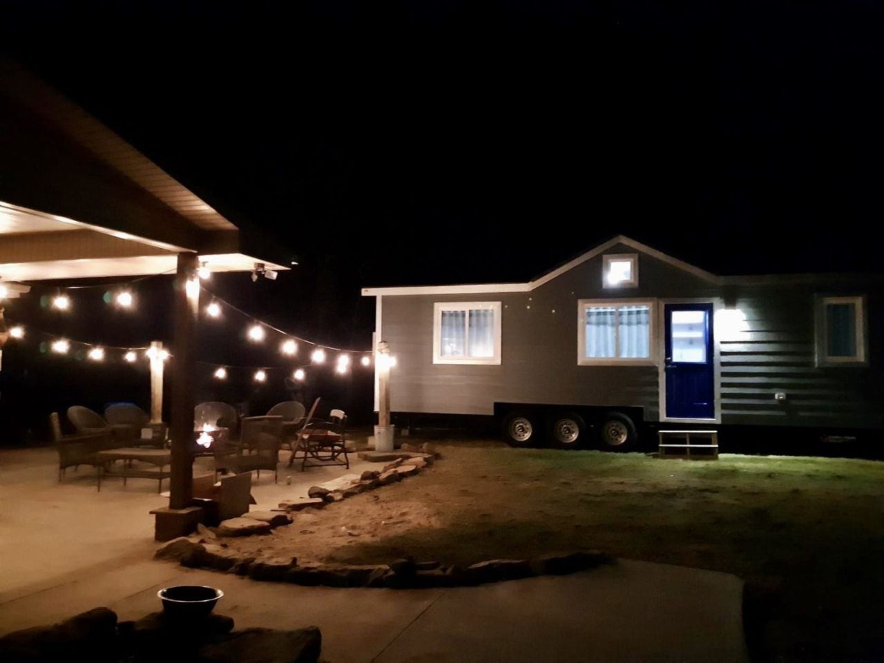 Storm tiny house on triple-axle trailer
