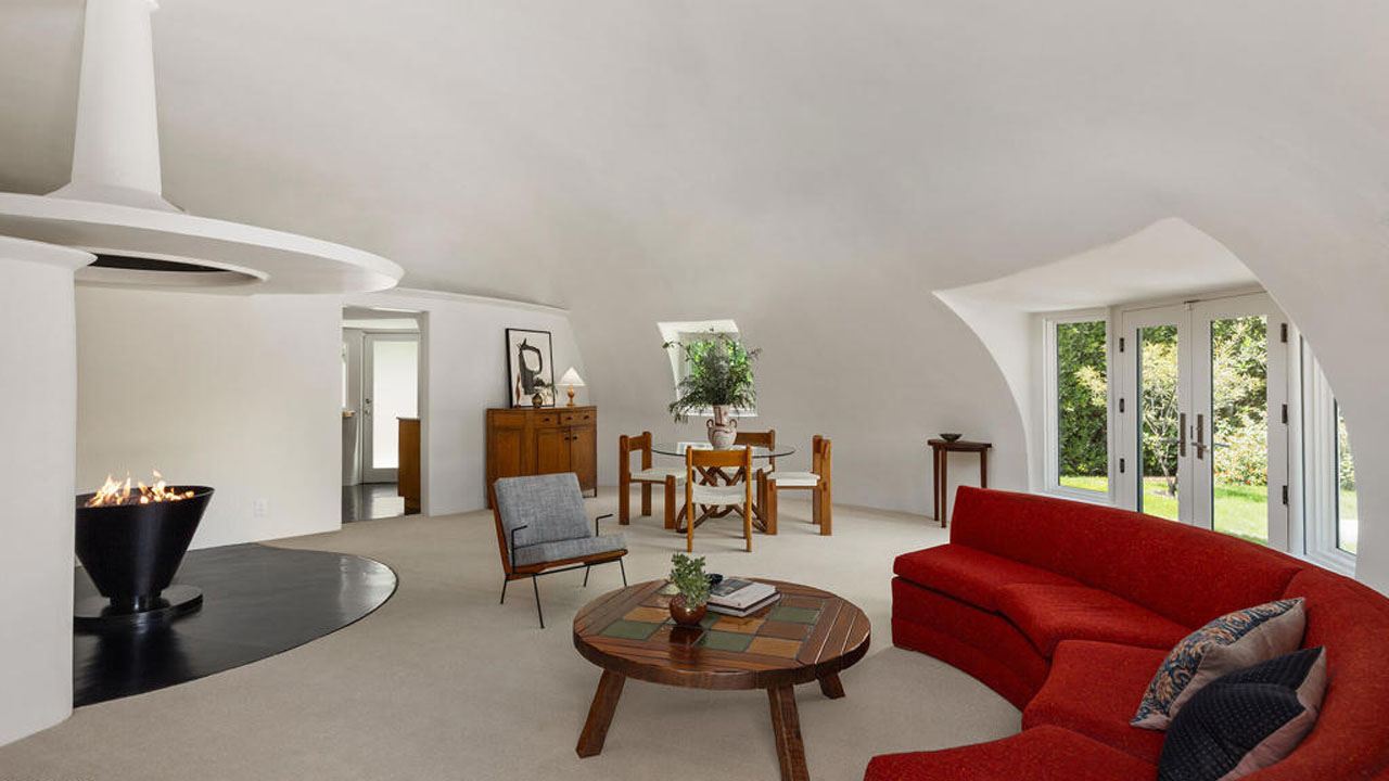 The red seating pops against the white interior