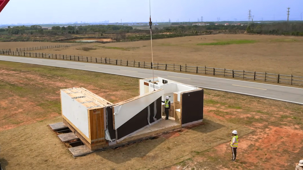Unfold House gets unfolded with a crane