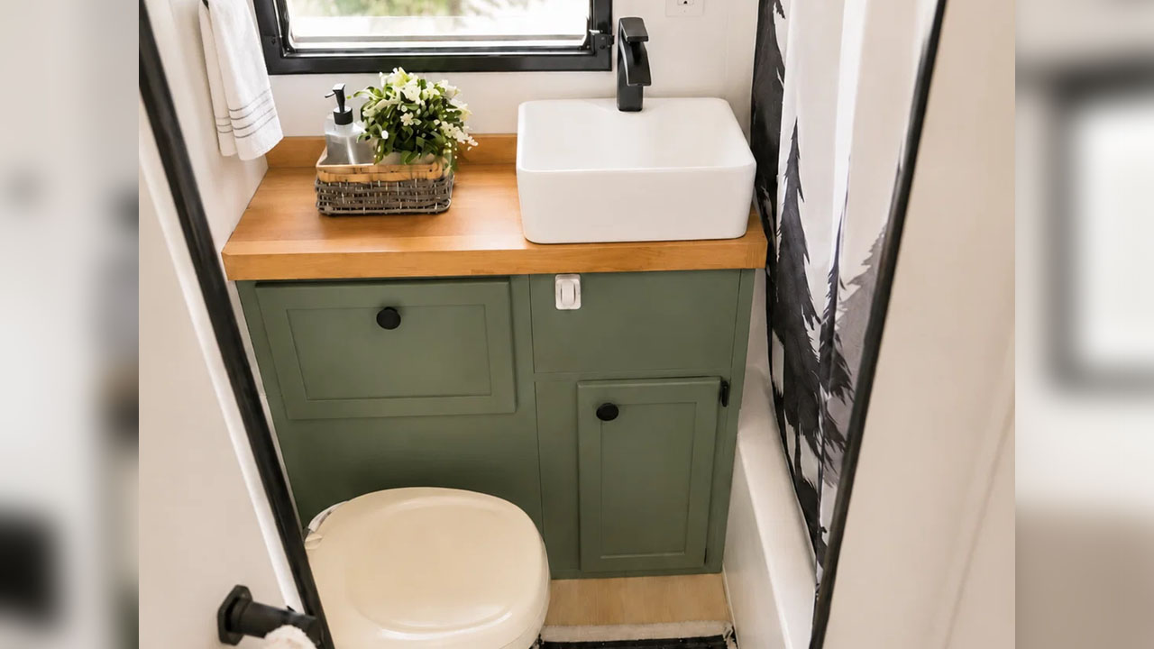 The redwood slab countertop of the vanity sink