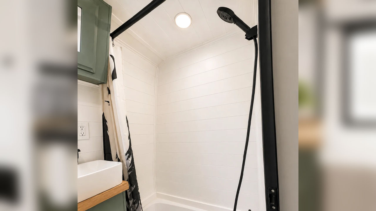 The showerhead placed above the bathtub
